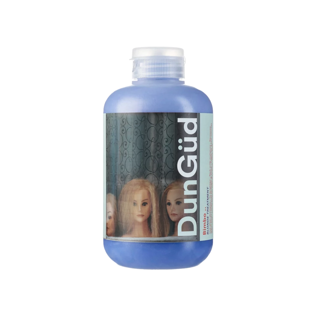 Paarse fles Dungüd Bimbo Blonde Treatment shampoo met een etiket waarop poppenhoofden met blond haar staan afgebeeld.