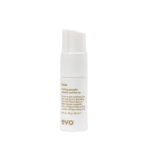 Witte flacon van 10 g evo haze styling powder met pompdispenser.