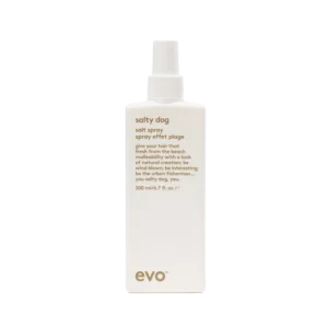 Witte fles Evo Salty Dog Salt Spray van 200 ml met gouden tekst op de voorkant.
