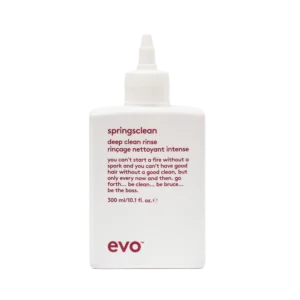 Witte fles Evo Springsclean deep clean rinse van 300 ml met bordeauxrode tekst op de voorkant.