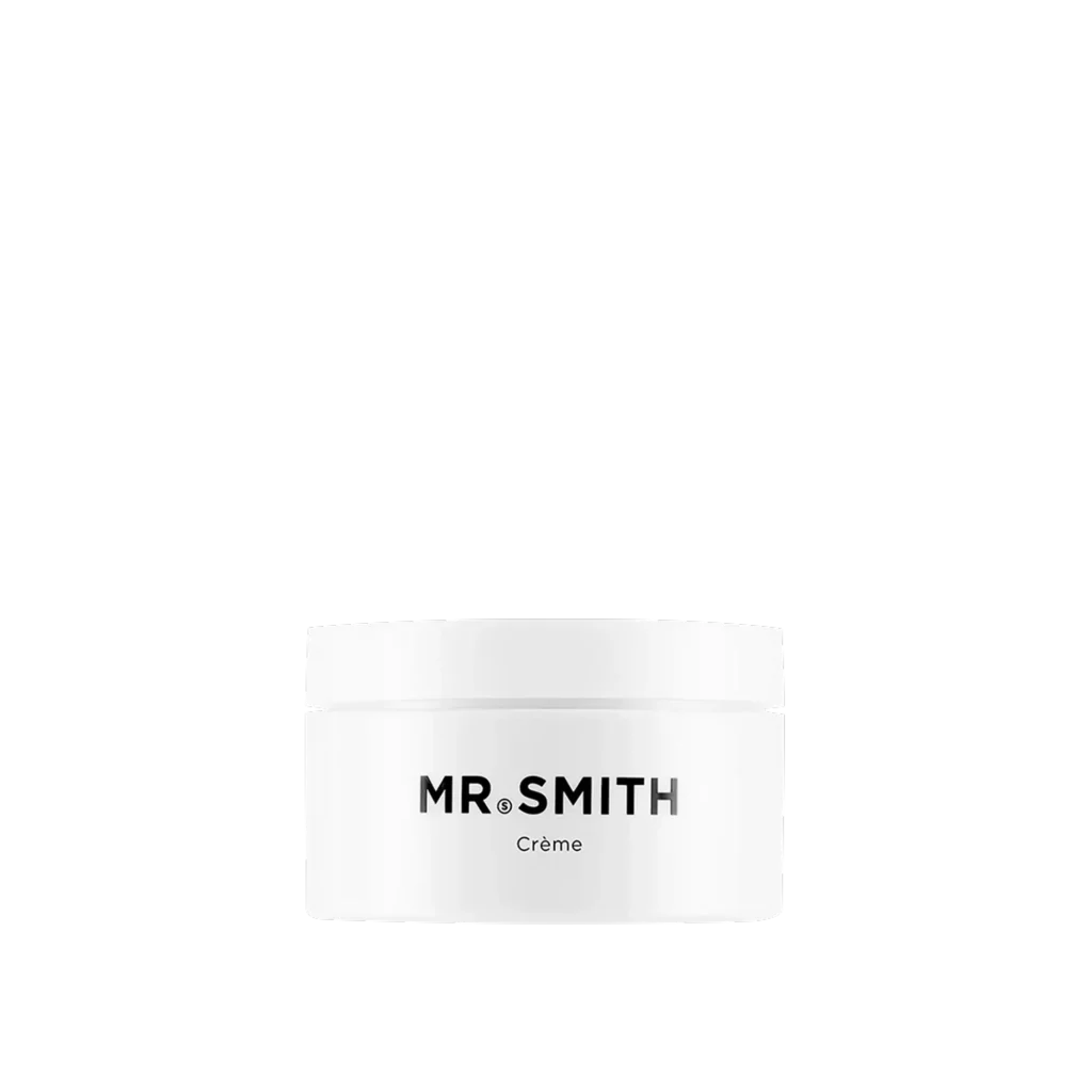 Witte pot Mr. Smith Crème met minimalistisch zwart logo op zwarte achtergrond.