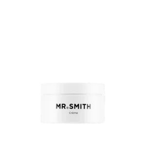 Witte pot Mr. Smith Crème met minimalistisch zwart logo op zwarte achtergrond.