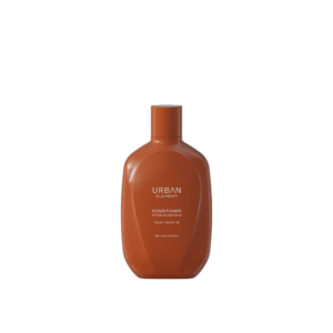 Bruine fles Urban Alchemy Conditioner Repair Replenish met Bio-Lab-Complex op zwarte achtergrond.